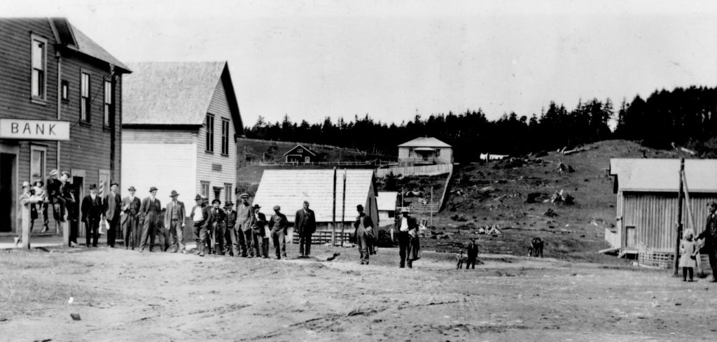 Port Orford Bank - Opening Day - 6th and Harbor Drive c1910. 351-building is on the left